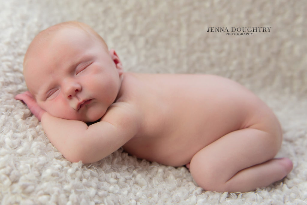 Sleepy newborn baby photography