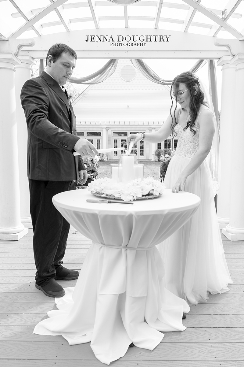 Lighting a unity candle at Wells Maine Wedding Ceremony 